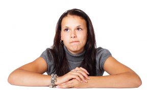1024px-Young_Woman_Thinking